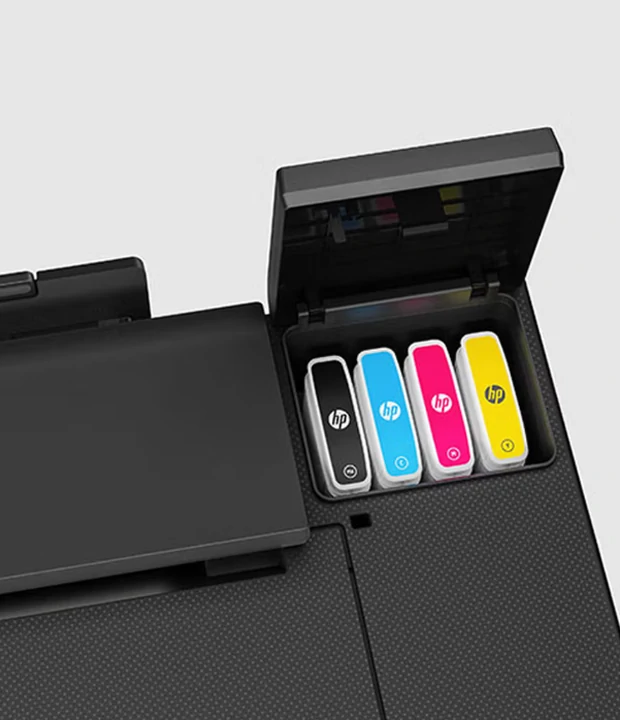 HP DesignJet T850 MFP ink cartridge compartment with four HP Flex Tech pigment ink cartridges